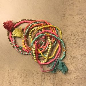 Set of beaded bracelets with tassels